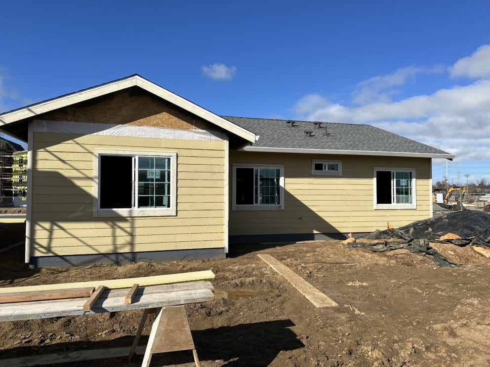 New build with lap siding and windows installed by IronNest Construction